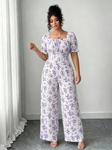 Elenzga Bộ áo liền quần nữ cổ vuông họa tiết hoa nhí, tay cánh hoa, lưng hở, thắt nơ phía trước. - Màu tím - Xem 4