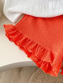 SHEIN Playful Pals 2件套女童白色和橙色针织波浪荷叶边柔软面料3D花朵圆领无袖荷叶边下摆上衣+松紧腰短款A字休闲甜美可爱套装，适合春夏日常穿着、上学、公园、旅行、摄影及各种场合。 - 橘色 - 查看 5