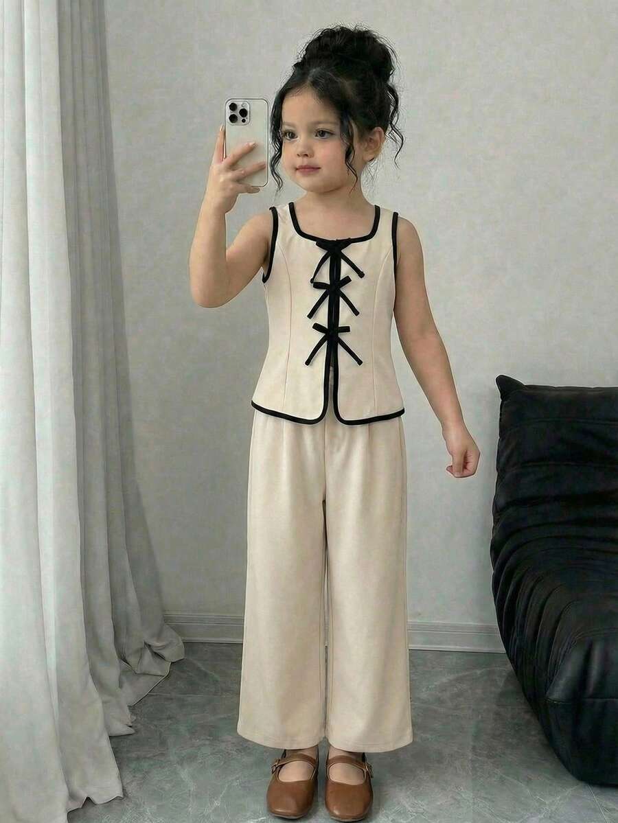 SHEIN 2 Pieces Knit Solid Sleeveless Top & A-Line Skirt Set For Young Girls, 2 Pcs/Set Tween Girl Casual Chic Commuting Round Neck Contrast Color Bowknot Vest & Cropped Pants Suit, Spring/Summer Girls Linen Outfit Girls Outfits Sets Kids Clothes For Girl Kids Formal Attire Girl - Khaki - View 1
