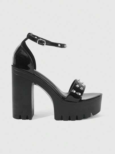 ROMWE Grunge Punk Giày sandal cao gót hở mũi thời trang và gợi cảm dành cho nữ, phối màu đen và đỏ, mang phong cách Punk/Gothic với đinh tán kim loại thanh lịch, thiết kế quai đơn, đế dày và gót chunky. Mẫu giày slip-on hoàn hảo cho mùa xuân và mùa hè, các câu lạc bộ đêm, tiệc tùng và lễ hội.