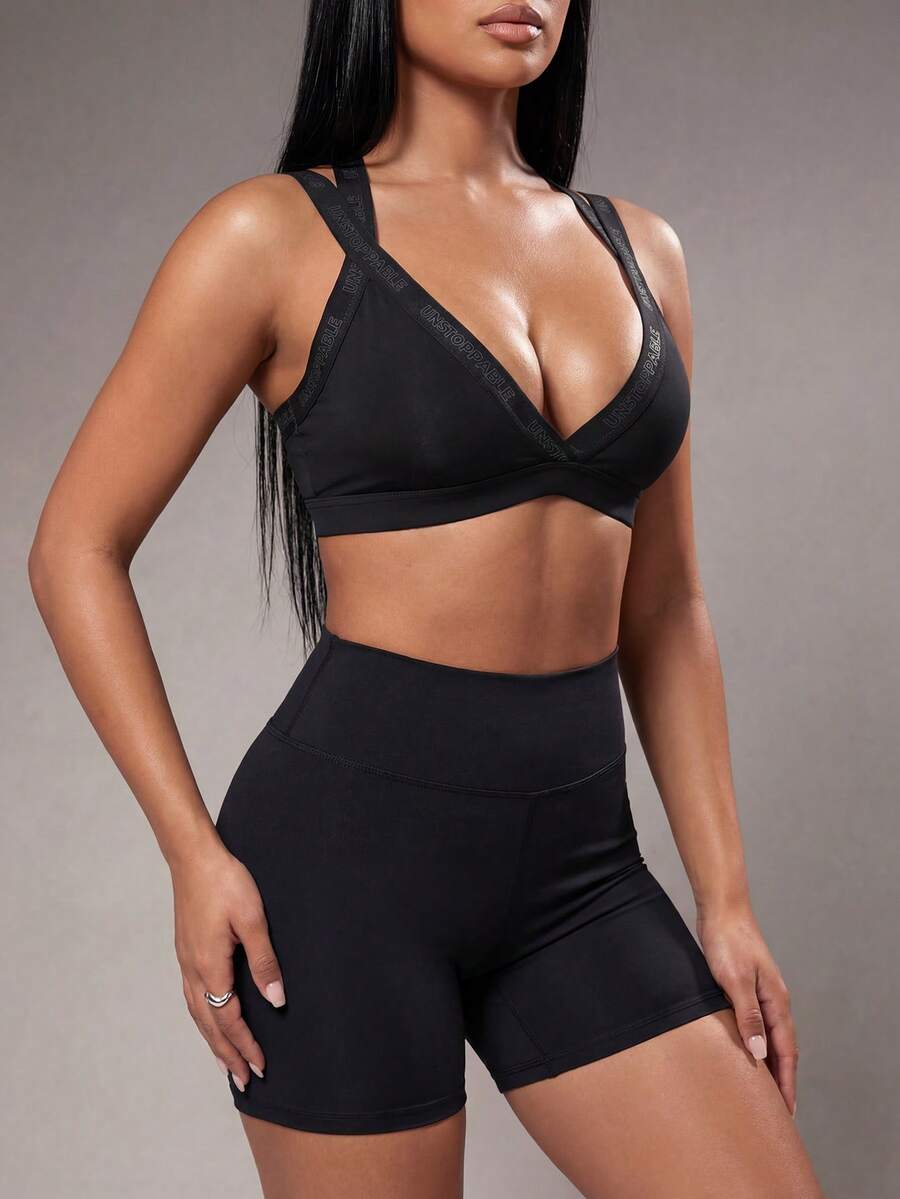 Radiana 女士字母提花露背日常健身运动胸罩