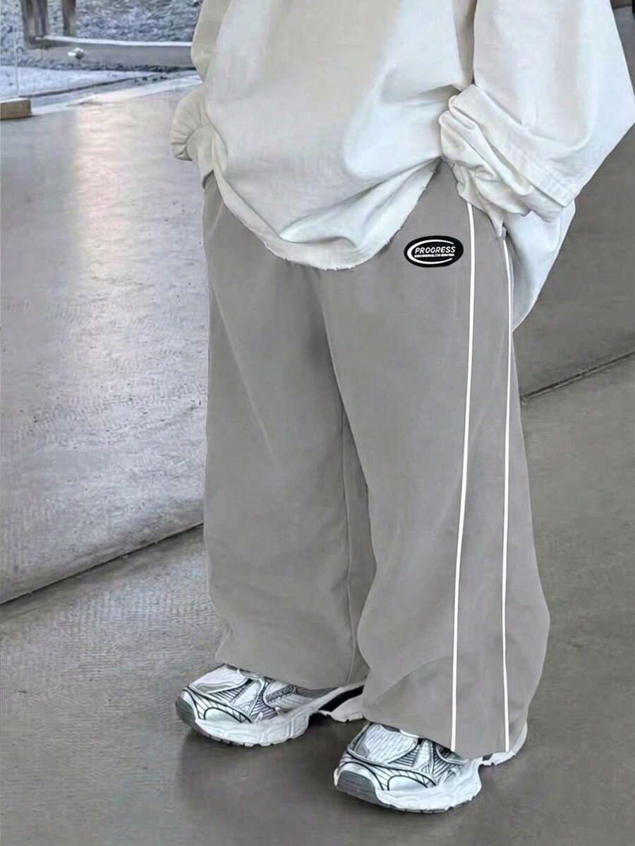 SHEIN 男童休闲运动裤,直筒版型,柔软舒适,配有装饰性抽绳,适合日常穿着、上学、户外活动和运动,春、夏、秋、冬四季皆宜。 - 灰色 - 查看 1