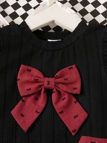 Elladie kids Bộ đồ 2 món cho bé gái gồm áo thun dệt kim jacquard màu đen cổ tròn tay loe điểm nơ đỏ và chân váy dệt kim màu đỏ cạp chun, thích hợp mặc hàng ngày vào mùa xuân/hè, đi chơi, du lịch và dự tiệc. - Màu Đỏ Sâu - Xem 5