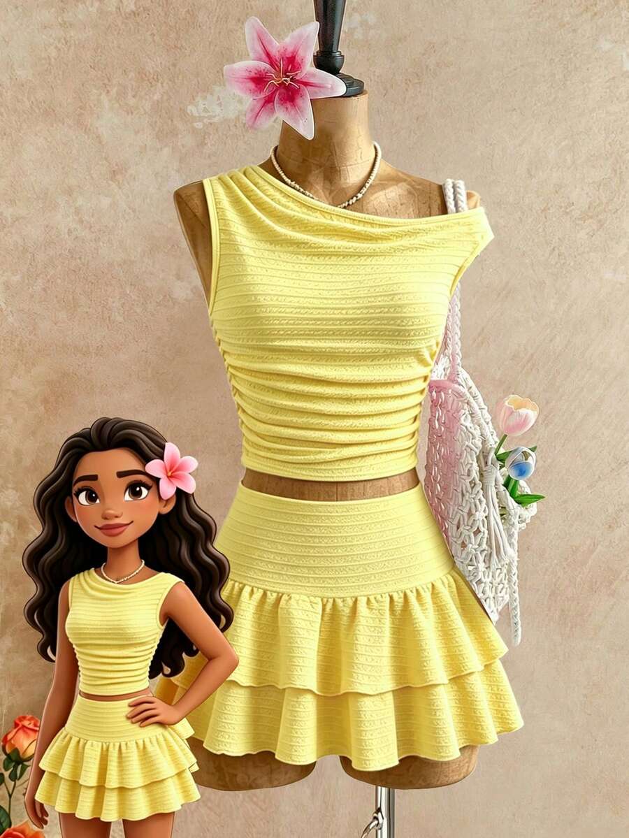 SHEIN 这款全新两件套少女套装包含一件时尚休闲、舒适透气的蓝色圆领针织提花背心和一条同色系双层层叠半身裙。背心腰部和下摆的褶裥设计,打造出优雅的整体造型。这款高品质套装适合日常穿着,也适合度假、旅行和派对等场合,是春夏的理想之选。 - 黃色 - 查看 1