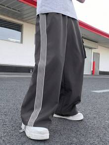 SHEIN 儿童/青少年男童休闲百搭舒适彩色织带字母印花直筒宽松纯色长裤，适合通勤、上学、日常休闲、旅行、运动，春夏秋冬皆宜。 - 灰色 - 查看 3
