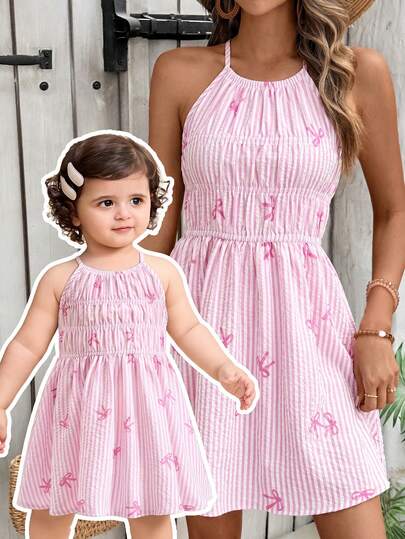 SHEIN Đầm sọc hồng nơ dễ thương cho bé gái, thích hợp mặc đi nghỉ mát mùa hè.
