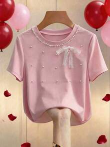 SHEIN Franclia 女士纯色情人节粉色蕾丝蝴蝶结珍珠装饰甜美Y2K风格短袖T恤，面料柔软舒适，适合夏季、春季穿着，粉色系，可作沙滩装、派对装、婚礼及活动上衣、生日礼物、外出装、优雅女式衬衫、度假装、休闲女式衬衫，适合约会、日常穿着、通勤等场合，百搭时尚，休闲粉色蝴蝶结上衣，婴儿粉上衣，粉色T恤，少女风上衣，粉色Y2K上衣 - 粉色 - 查看 3