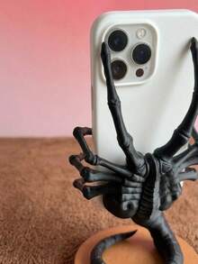 Joivida 1 pieza Soporte de teléfono con forma de Alien Face Hugger, soporte de escritorio de teléfono celular con tema de película de terror, soporte de teléfono 3D único con forma de monstruo para escritorio, hogar y oficina, regalo genial de soporte de teléfono para fans del terror, gamers y amantes del cine, material con base estable, perfecto para teléfono, tableta y dispositivos pequeños, excelente para decoración de escritorio, soporte de teléfono y regalo con tema de terror - Multicolor - Ver 2