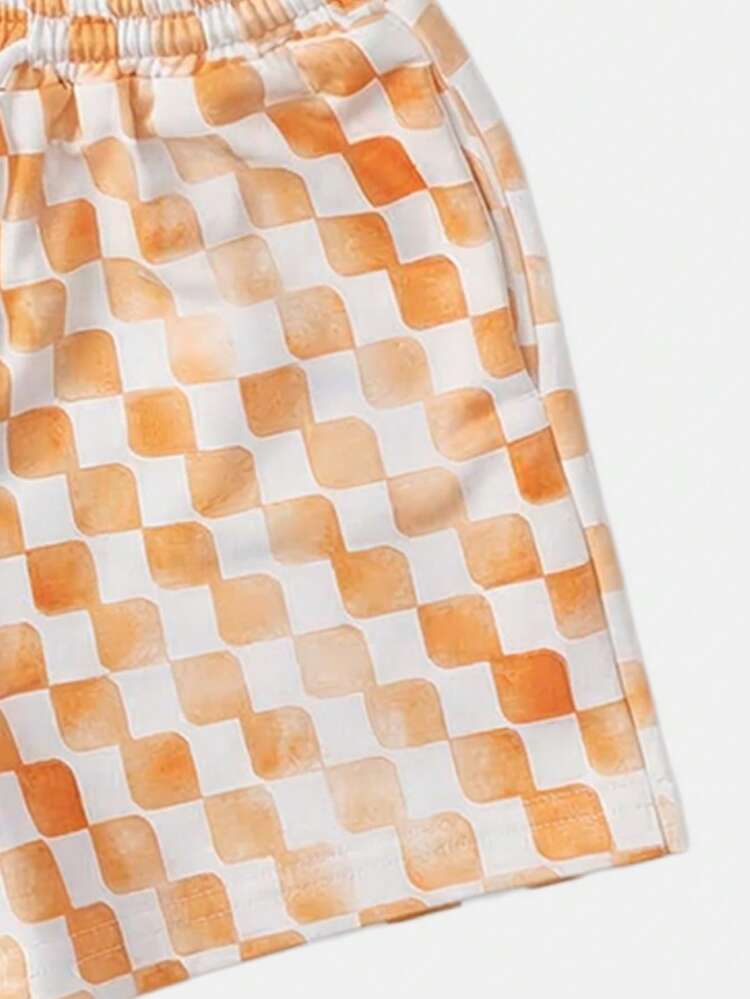 Set coordinato arancione oversize a quadri per ragazzi, composto da t-shirt casual e pantaloncini con stampa di un mercato di frutta
