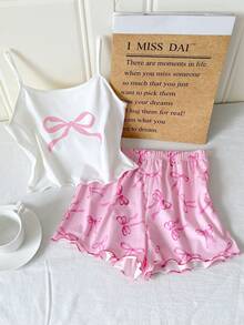 SHEIN Bộ đồ ngủ trẻ em Dozemod dành cho bé gái tuổi teen, gồm 2 món, hộp quà ngẫu nhiên: áo tay ngắn cài cúc cổ bẻ kiểu tối giản với nơ và sọc, cùng bộ đồ ngủ dệt kim rộng rãi, thoải mái. - Màu Hồng baby - Xem 3