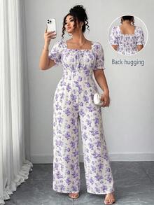 Elenzga Bộ áo liền quần nữ cổ vuông họa tiết hoa nhí, tay cánh hoa, lưng hở, thắt nơ phía trước. - Màu tím - Xem 1