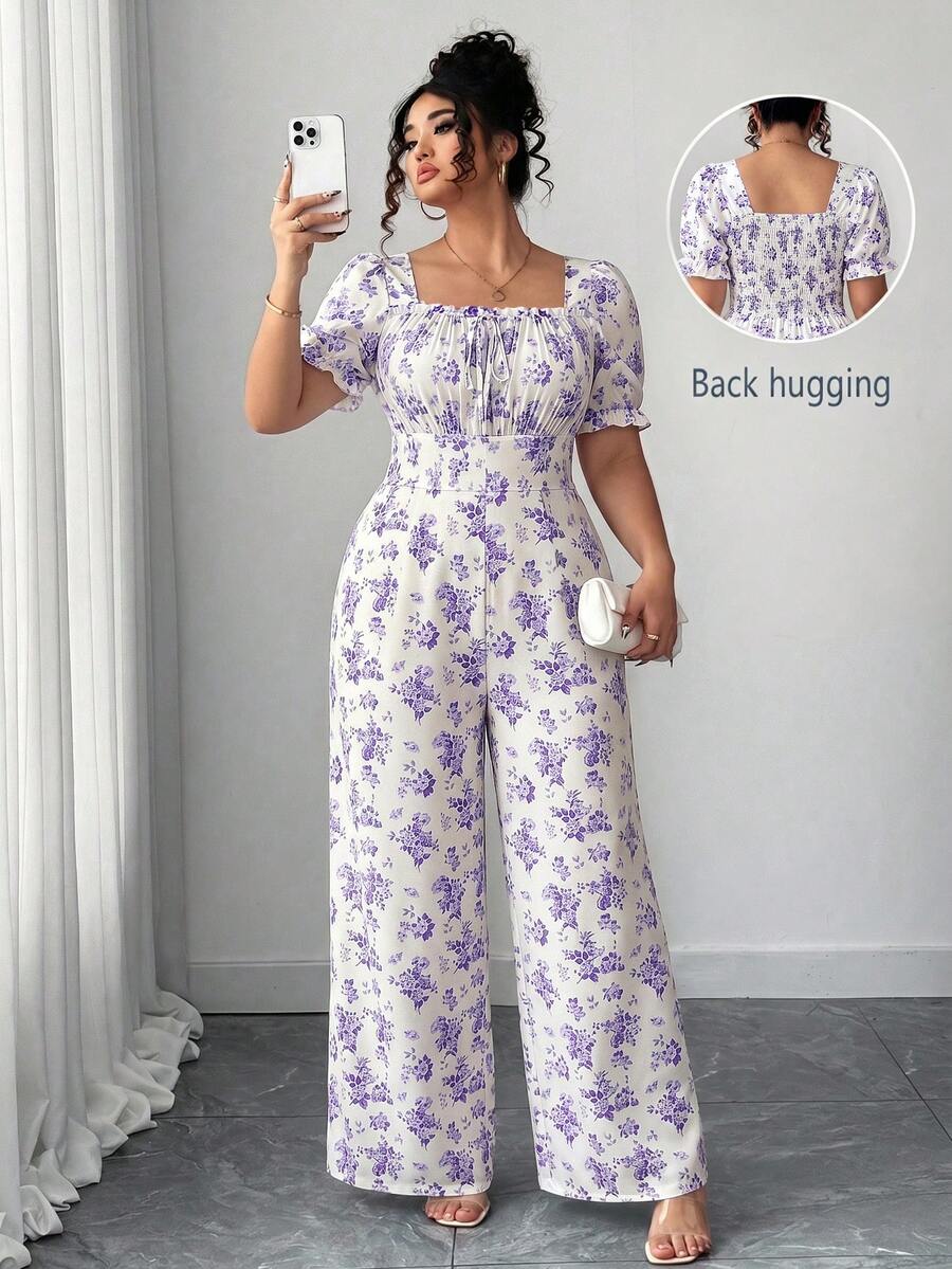 Elenzga Bộ áo liền quần nữ cổ vuông họa tiết hoa nhí, tay cánh hoa, lưng hở, thắt nơ phía trước. - Màu tím - Xem 1