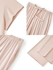 LUVLETTE Bộ đồ ngủ mùa hè tông màu kem mềm mại làm từ chất liệu TENCEL™ Modal, kiểu dáng cơ bản, gồm áo thun và quần, thoáng mát dành cho nữ. - Màu be - Xem 4