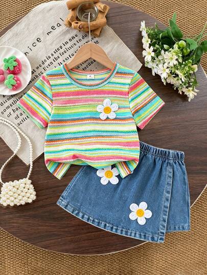 SHEIN Genkimix Kids Young Girl Summer New Cute Colorful Striped Dopamine Floral Print Short Sleeve Round Neck Soft T-Shirt And Denim Skort Set