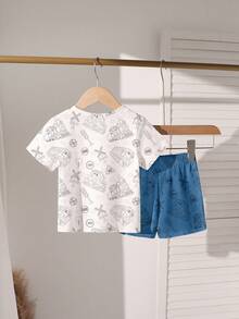 SHEIN Genkimix Kids 两件套休闲舒适百搭男童运动套装，柔软短袖T恤和短裤，可爱卡通火车图案，适合夏季穿着，时尚休闲，返校季、户外野餐、街头摄影、校园活动、节日庆典，也是馈赠佳品。 - 彩色 - 查看 4