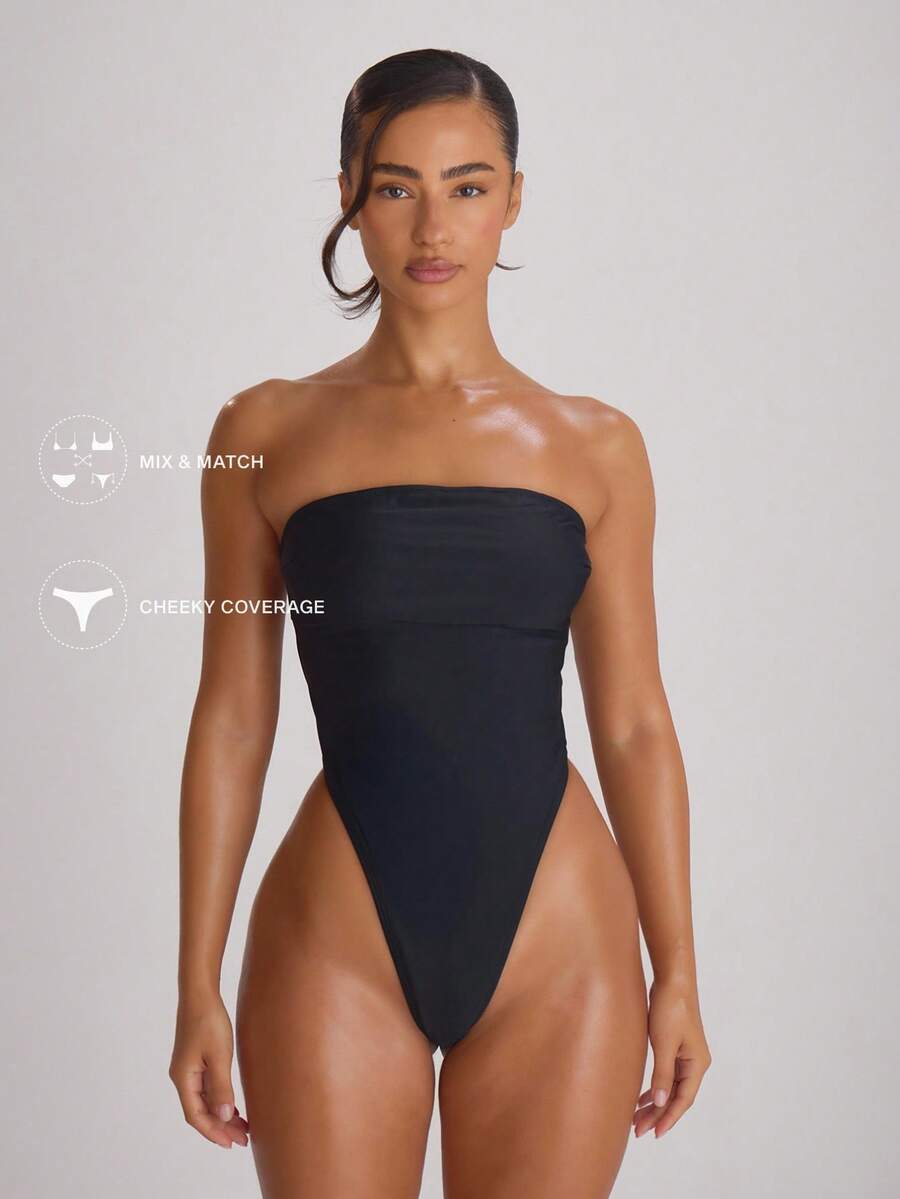 Musera Resort Maillot de bain bandeau à jambes hautes avec découpe dans le dos. Tenues de bain pour vacances, voyages d'été et plage. Modèle basique de couleur unie pour station balnéaire - Noir - Voir 1