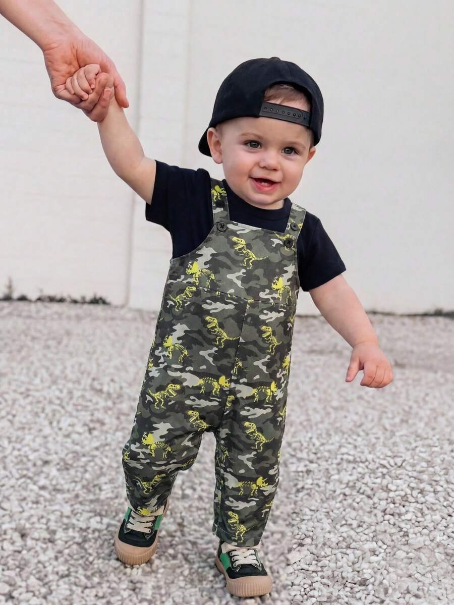 SHEIN Pelele de verano para bebé recién nacido niño con estampado de dinosaurio de camuflaje verde lindo y versátil, con pantalones de tirantes - Multicolor - Ver 1