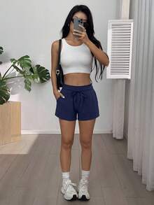 SHEIN EZwear Quần short nữ màu xanh navy trơn, kiểu dáng thường ngày, cạp chun, túi bên hông, mùa hè 2026. - Xanh đậm - Xem 5