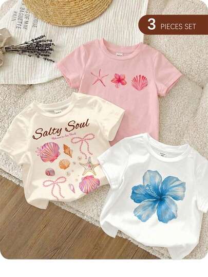 SHEIN 3 chiếc áo thun tay ngắn cổ tròn in họa tiết hoa nhiệt đới, hoa dâm bụt, vỏ sò, sao biển cho bé gái, phù hợp cho mùa xuân/hè, màu trắng, màu be, màu hồng nhạt