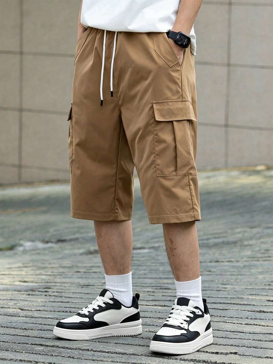 Manfinity Hypemode Quần short nam hàng ngày đơn giản có dây rút màu trơn rộng thùng thình kaki trơn đi chơi - Màu Khaki - Xem 1