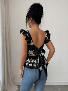 Blusa de manga corta con lazo en la espalda y cintura ceñida, con estampado posicionado en color negro sobre base color albaricoque, para mujer - Negro - Ver 2