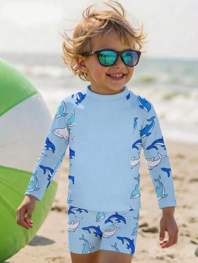 SHEIN Young Boy Casual Cute Style Cartoon Whale & Shark Pattern Ocean World Marine Blue Vacation Beach Swimwear Round Neck Short Sleeve T-Shirt & Shorts Set, Suitable For Summer
