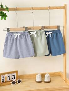 SHEIN Bộ 3 quần short cho bé sơ sinh/trẻ nhỏ, kiểu dáng unisex, màu mơ kẻ caro, màu trơn, sọc, cạp chun, chất liệu mềm mại và thoải mái, thích hợp cho mùa hè. - Nhiều màu - Xem 9