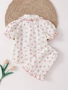 Bộ 2 món đồ ngủ cho bé gái, gồm áo cardigan cổ bèo tay cánh hoa và quần short viền bèo, họa tiết hoa dễ thương, thích hợp cho mùa hè. - Màu be - Xem 2