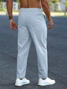 Manfinity Homme Pantalones casuales para hombres de unicolor con cordón en la cintura y bolsillos - Celeste - Ver 2