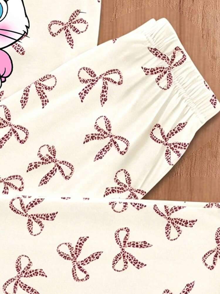 SHEIN Bộ đồ mặc nhà màu trắng kem và hồng kem, in hình mèo dễ thương, gồm áo tay ngắn cổ tròn dáng ôm và quần ngắn, thích hợp cho bé gái mặc hàng ngày vào mùa xuân/hè, ở nhà, thư giãn, phong cách nữ tính, thoải mái, dễ mặc. - Nhiều màu - Xem 5