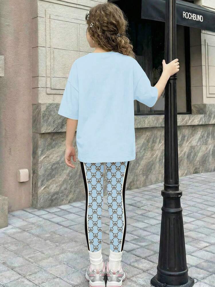 Bộ đồ 2 mảnh áo tay ngắn và quần ngắn dáng rộng thoải mái cho bé gái, họa tiết hình học retro dễ thương, phong cách thập niên 2000, kiểu Hàn Quốc, mùa thu, lễ hội trường, mùa đông, phong cách grunge, kẻ sọc, thoải mái dễ chịu, trẻ em sành điệu, phong cách hippie, lễ hội âm nhạc, BM, phong cách vintage Mỹ ngọt ngào, dạo phố, phong cách đường phố, thể thao thường ngày trong khuôn viên trường, dã ngoại ngoài trời, đi chơi, chụp ảnh đường phố, trường học, thư giãn. - Nhiều màu - Xem 2
