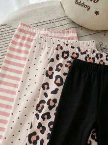 Bộ 4 quần legging cho bé gái, kiểu dáng thường ngày, đa năng, mềm mại, kẻ sọc, họa tiết da báo, hình trái tim và màu đen trơn, giá cả phải chăng, phù hợp cho các hoạt động vui chơi trong nhà hoặc ngoài trời vào mùa xuân/hè. Kiểu dáng tối giản, ngọt ngào, dễ thương, dài đến mắt cá chân, phù hợp cho mùa xuân/hè hoặc mọi mùa. - Nhiều màu - Xem 3