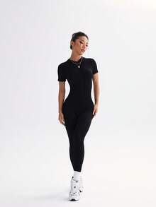 Bộ đồ liền thân thể thao có khóa kéo cho nữ - màu đen - Xem 6