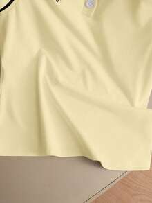 GlowEve Chaleco sin mangas de punto con cuello polo, bordado y de colores contrastantes - amarillo ganso - Ver 7
