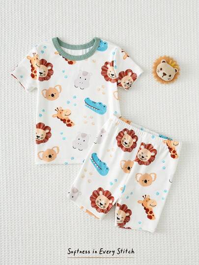 Cozy Pixies Bộ đồ ngủ 2 mảnh ôm sát cho bé trai, gồm áo thun cổ tròn tay ngắn và quần đùi cạp chun in hình động vật hoạt hình.