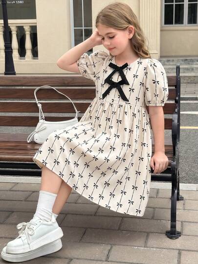 SHEIN Tween Girls Woven Casual Bow Print Front Bow Decor Petal Sleeve Loose A-Line Dress