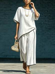 SHEIN Holidaya Bộ 2 món gồm áo tay ngắn màu trắng và quần dài cạp cao, trang phục mùa hè thanh lịch dành cho nữ. - Đen và trắng - Xem 6