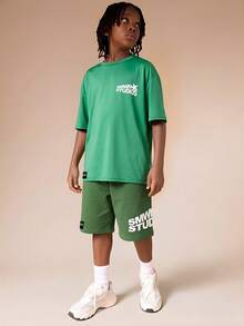 SUMWON Studios Logo Tween Boys Short Sleeve T Shirt And Shorts Co Ord Set Green Pastel Graphic Print Two Piece Outfit - Green - View 2