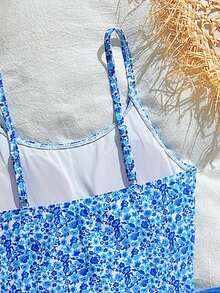 SHEIN Bộ đồ bơi liền thân cho bé gái tuổi teen với họa tiết hoa nhí, kết hợp với chân váy lưới, thời trang, giản dị, thanh lịch, duyên dáng, năng động, dễ thương, tinh nghịch, tràn đầy năng lượng, thích hợp cho bơi lội. - Nhiều màu - Xem 4