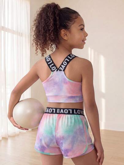 SHEIN Girls' Tie-Dye Sports Set, Letter Strap & Waistband, Oversized Tie-Dye Pattern, Cropped Tank Top And Contrast Trim Sports Shorts