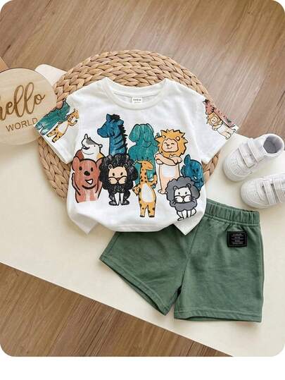 SHEIN Suéter holgado de punto con cuello redondo, estampado de animales de dibujos animados, estilo casual y lindo, con gráfico pintado a mano, adecuado para primavera/verano, para niño bebé