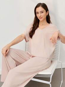 LUVLETTE Bộ đồ ngủ mùa hè tông màu kem mềm mại làm từ chất liệu TENCEL™ Modal, kiểu dáng cơ bản, gồm áo thun và quần, thoáng mát dành cho nữ. - Màu be - Xem 9