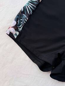 SHEIN Conjunto de traje de baño con top de manga raglán y shorts con estampado de plantas tropicales para adolescentes - Negro - Ver 7