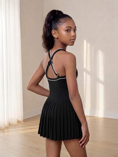 SHEIN Đầm thể thao màu đen cho bé gái tuổi teen – Đầm hai dây kiểu racerback với thiết kế chéo lưng, chất liệu vải mềm mại co giãn cao, thích hợp cho tập thể dục, tennis, chạy bộ và thể thao.