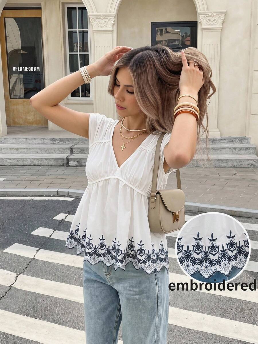 Serisse Damen Marineblau und Weiß Boho Blumen bestickte V-Ausschnitt Kurzarm Peplum Bluse, Sommer Urlaub Feiertag Lochstickerei Weiß Babydoll Top Strand - Blau-Weiß - Übersicht 1