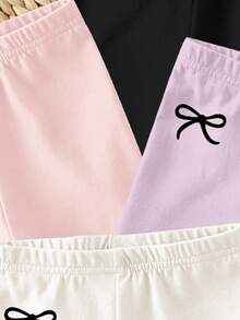 SHEIN Playful Pals Bộ 4 món quần legging/quần short/quần dài màu trơn cho bé gái, cạp chun, thiết kế nơ dễ thương, màu hồng Dopamine & kem, trang phục mùa xuân hè, trang phục thường ngày, quần áo trẻ em họa tiết hoa, bộ đồ mùa xuân hè, kiểu dáng mới, thư giãn, không khí mùa xuân, kỳ nghỉ hè thư thái - Nhiều màu - Xem 3