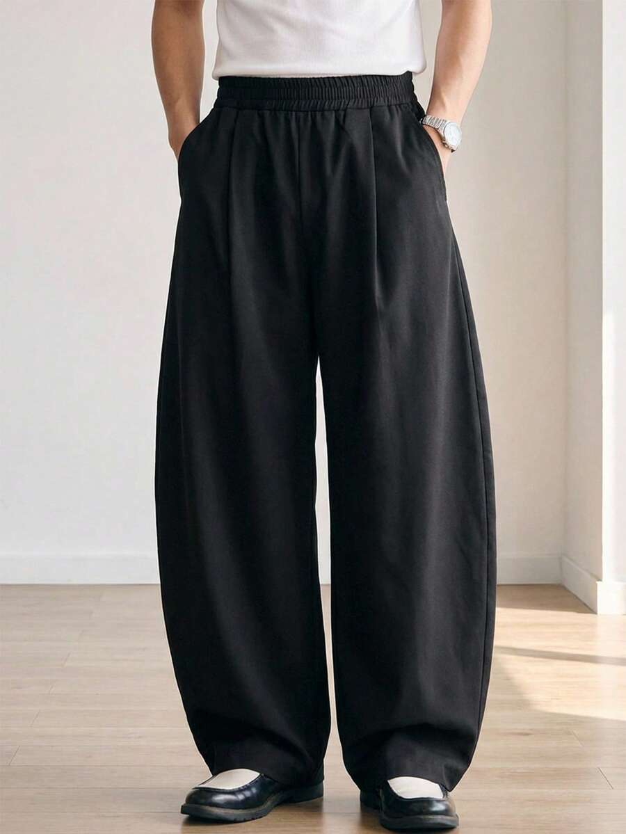 DAZY Pantalones largos de hombre de estilo callejero de color negro sólido con bajo curvo - Negro - Ver 1