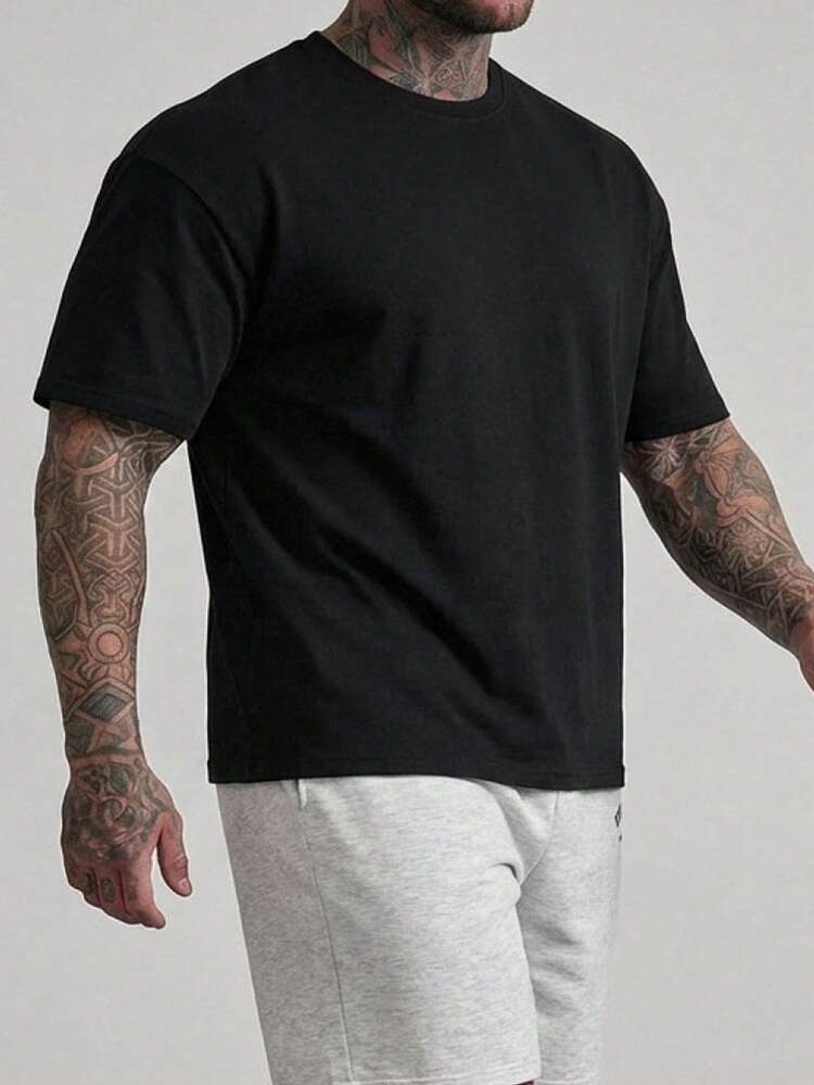 Solid Black Loose Fit Short Sleeve T-Shirt, Plus Size For Men