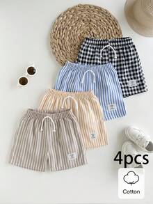 SHEIN Explorewe Bộ 4 món quần short thể thao thường ngày cho bé trai, phong cách đường phố, kẻ caro và sọc, phù hợp cho mặc hàng ngày, đi học, dã ngoại, thể thao, mùa xuân và mùa hè. Thiết kế đơn giản và thời trang, thoải mái khi mặc, mang đến nhiều lựa chọn phối đồ cho bé trai. Bộ trang phục này sẽ là lựa chọn sành điệu cho bé trai trong mùa hè, phù hợp cho kỳ nghỉ, chụp ảnh, xu hướng thời trang mới xuân/hè 2026. - Nhiều màu - Xem 4