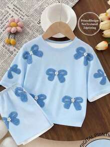 SHEIN Bộ quần áo ngắn tay in hình nơ màu xanh dương dành cho bé gái tuổi teen, trang phục thường ngày thoải mái, thời trang mùa xuân/hè, thiết kế đa năng phù hợp cho hoạt động ngoài trời, thể thao, dã ngoại, chụp ảnh đường phố, ở nhà, đi học, kỳ nghỉ, làm quà tặng. - Nhiều màu - Xem 3